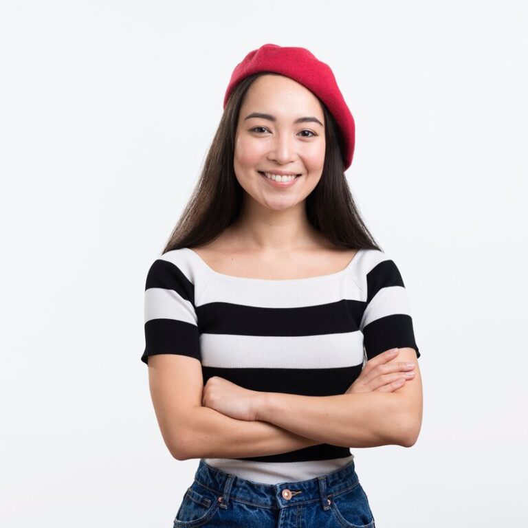 smiley female standing with arms crossed 23 2148418540 768x768 1